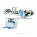 Paper box gluing and folding machine